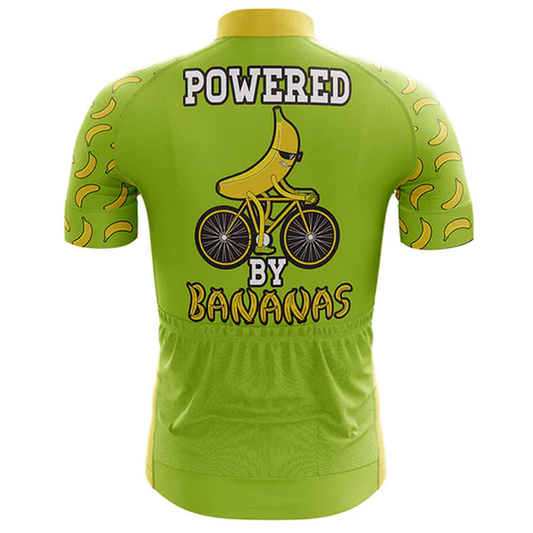 Green cycling jersey with banana-themed design on a white background