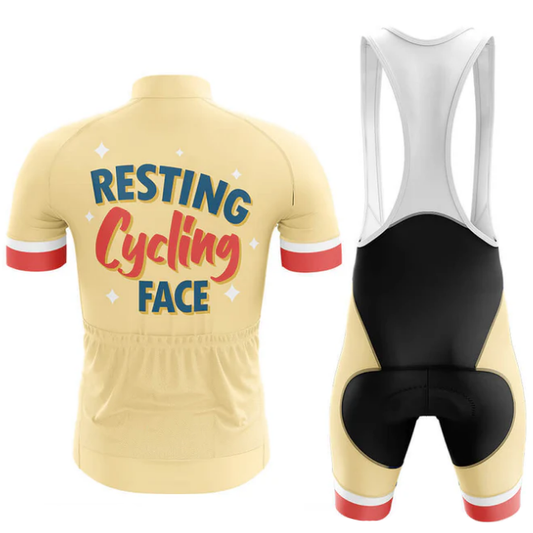 Yellow cycling jersey with text and black bib shorts on a white background