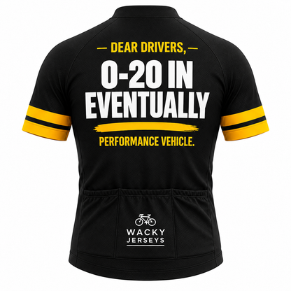 Black short-sleeve cycling jersey shown from the back with bold white and yellow text reading “DEAR DRIVERS, 0-20 IN EVENTUALLY PERFORMANCE VEHICLE.” and a visible “WACKY JERSEYS” logo near the lower back pocket.
