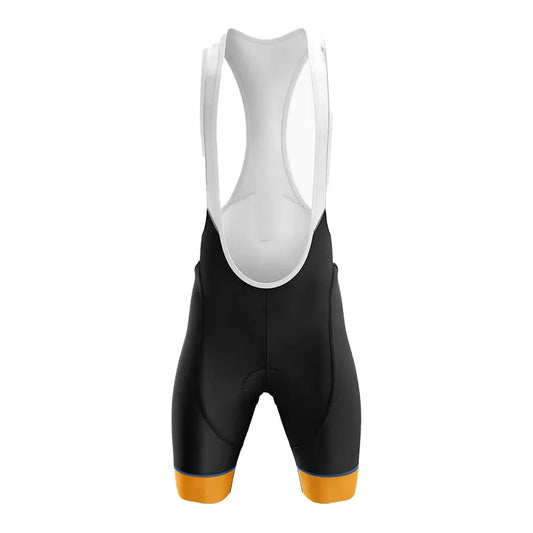 Black cycling bib shorts with white top and yellow accents on a white background