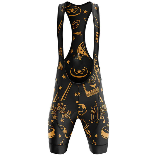 Black cycling bib shorts with gold graphics on a white background